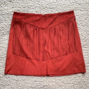 burnt orange skirt with fringe in front